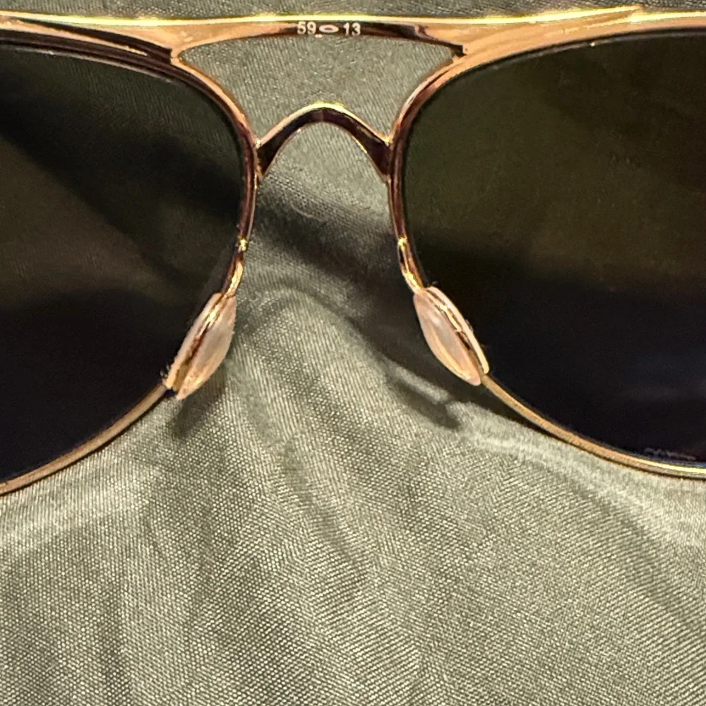 Oakley Tortoiseshell Frame Sunglasses with Blue Lenses with case
